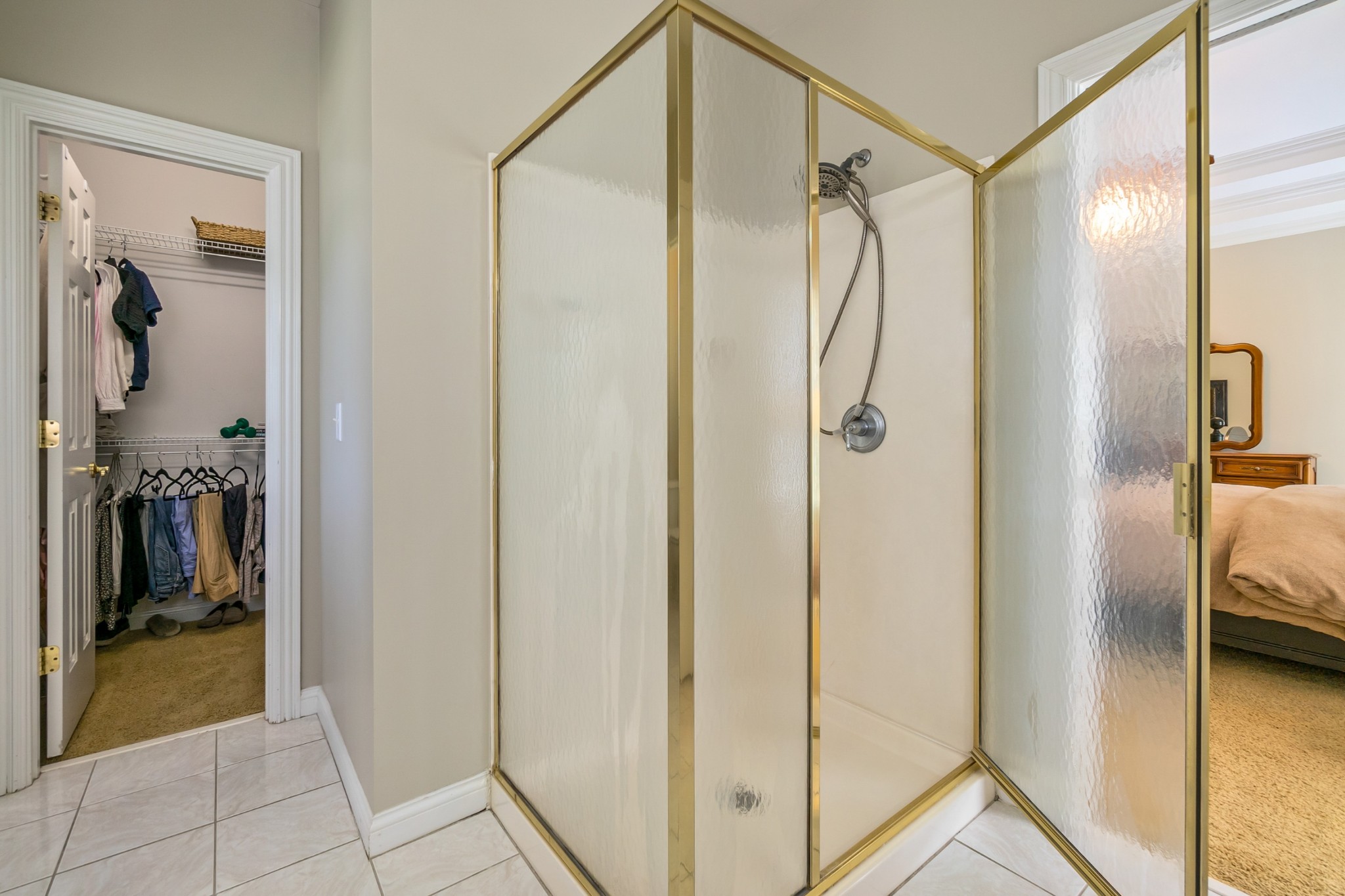 413 Doe Ridge Franklin, TN 37067 - Photo 22 of 42 a bathroom with a shower and a sink