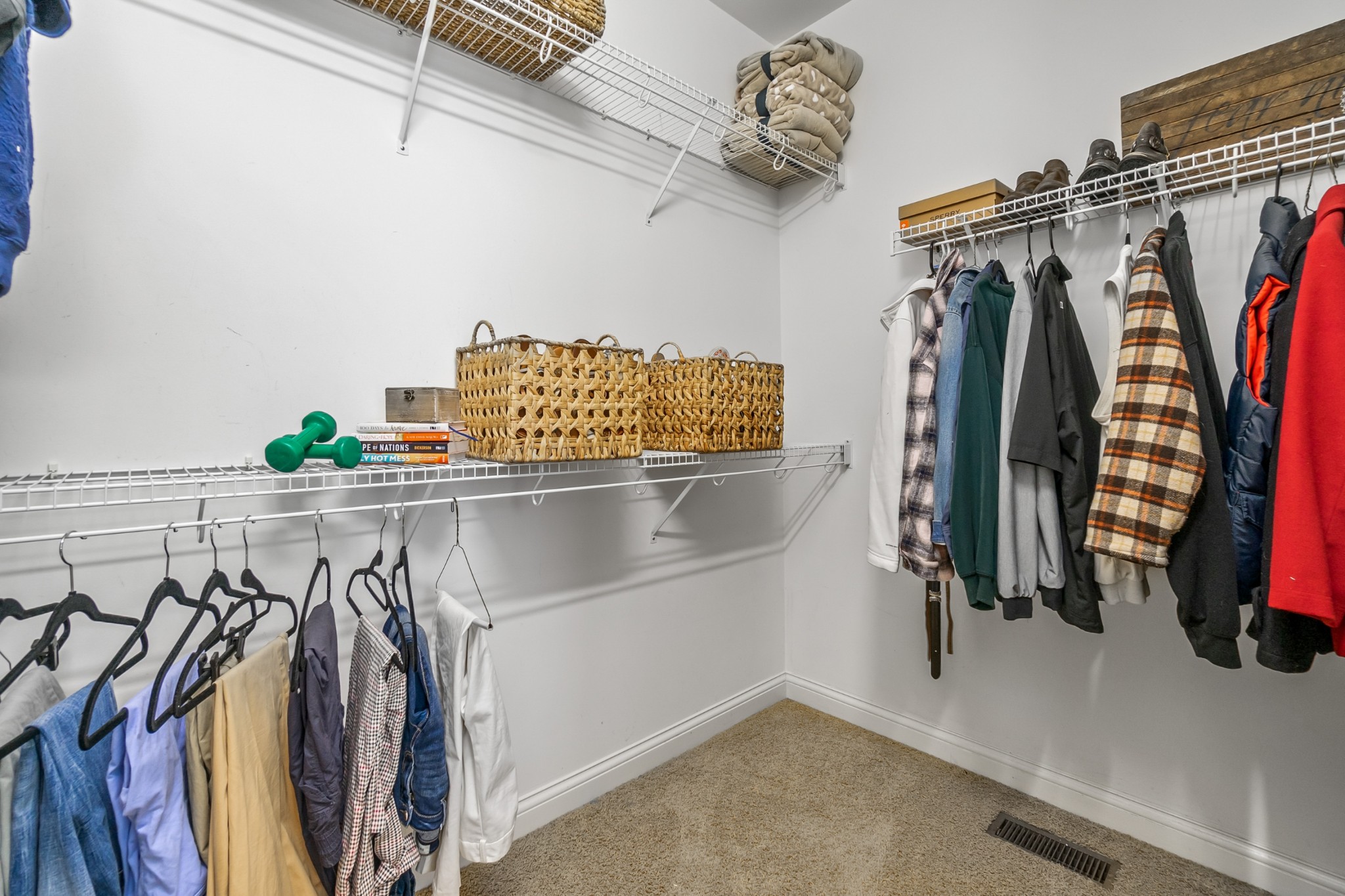 413 Doe Ridge Franklin, TN 37067 - Photo 23 of 42 a view of walk in closet with clothes