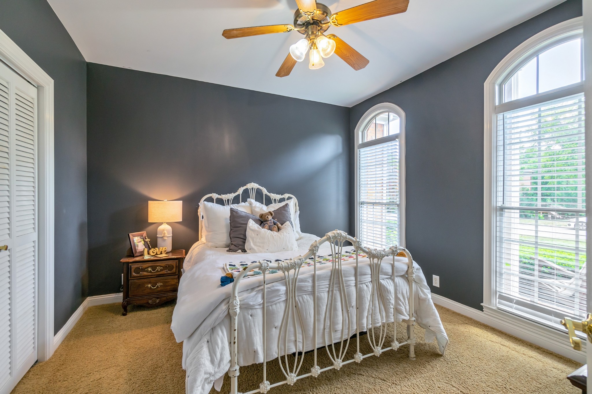 413 Doe Ridge Franklin, TN 37067 - Photo 25 of 42 a bedroom with a bed and window