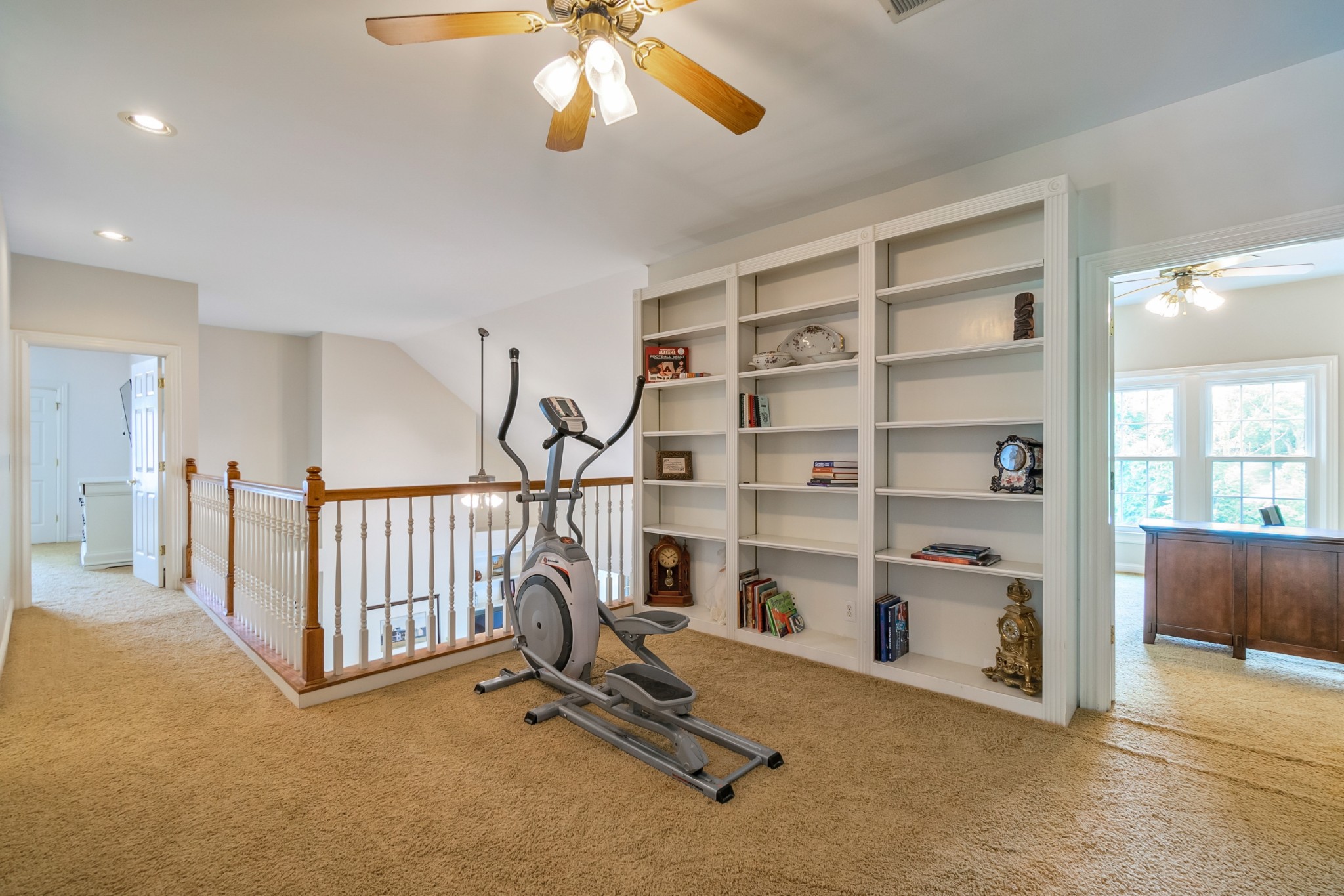 413 Doe Ridge Franklin, TN 37067 - Photo 30 of 42 a view of a livingroom with furniture and staircase