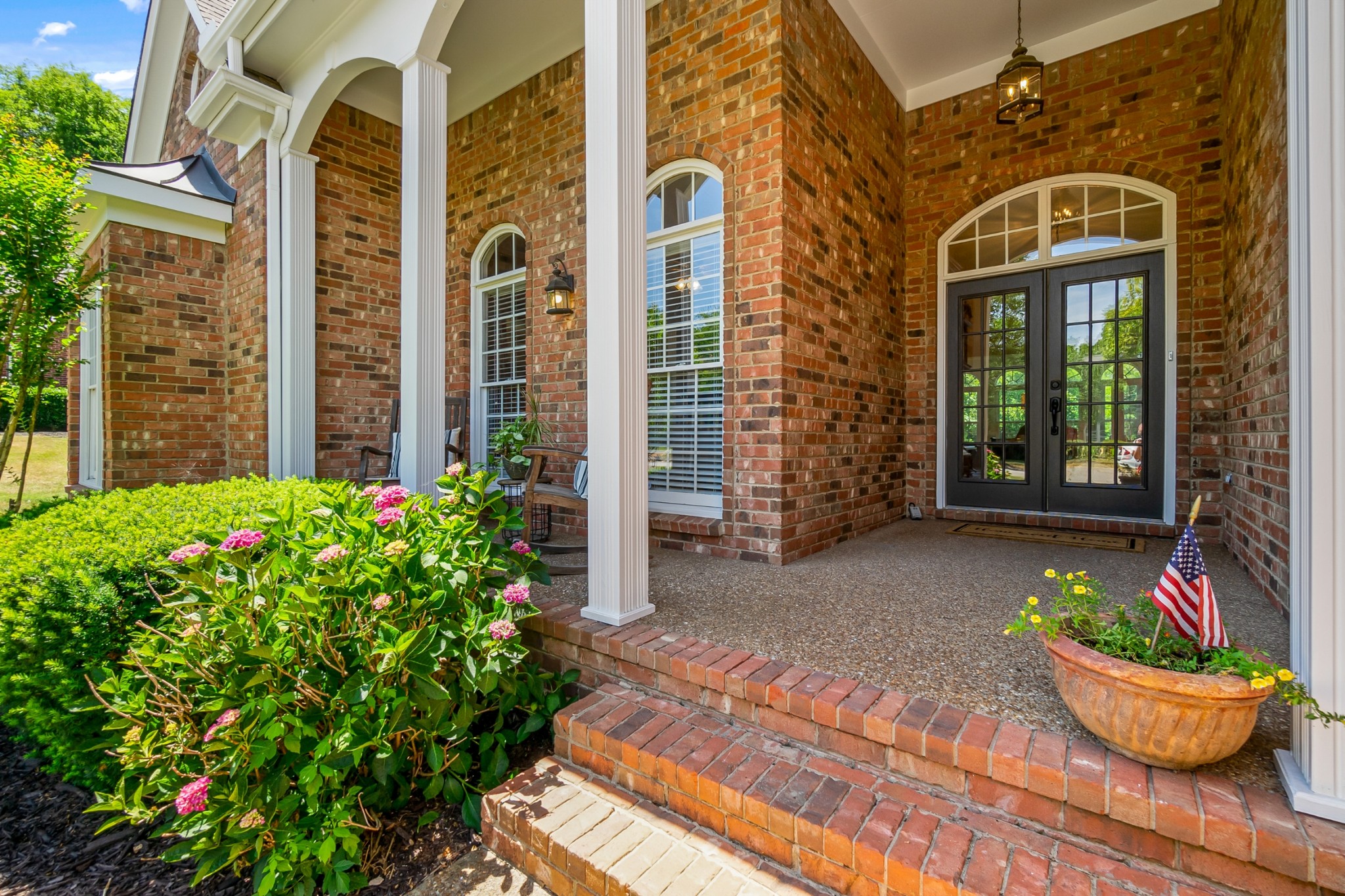413 Doe Ridge Franklin, TN 37067 - Photo 3 of 42 a front view of a house having yard