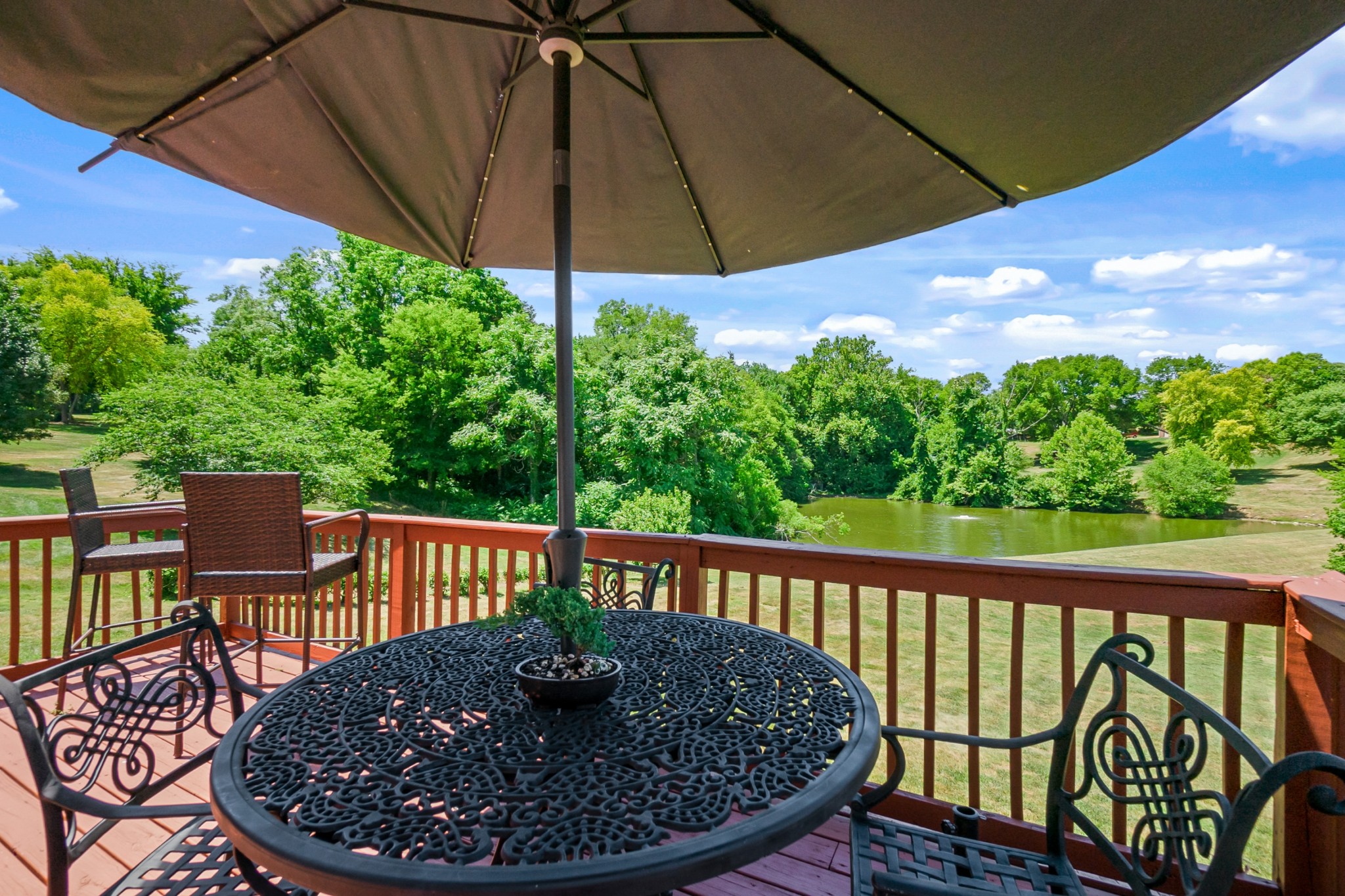 413 Doe Ridge Franklin, TN 37067 - Photo 37 of 42 a view of a chair and table in the balcony