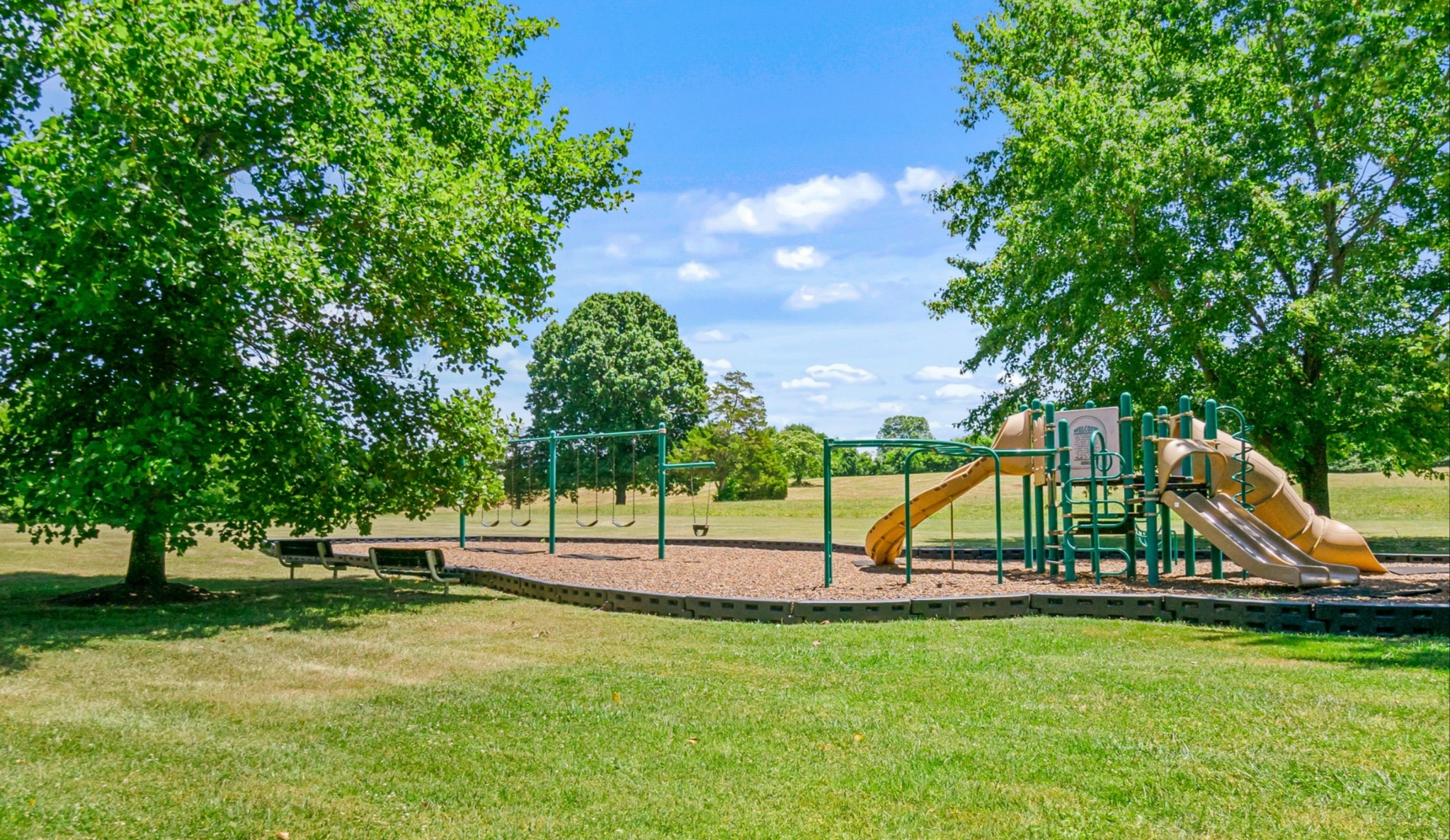413 Doe Ridge Franklin, TN 37067 - Photo 41 of 42 a view of park with swings