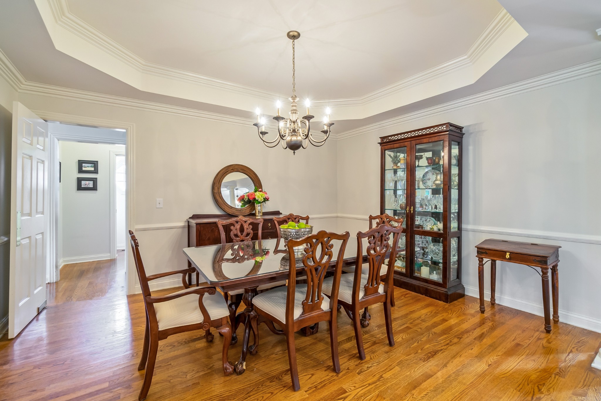 413 Doe Ridge Franklin, TN 37067 - Photo 5 of 42 a view of a dining room with furniture window and wooden floor