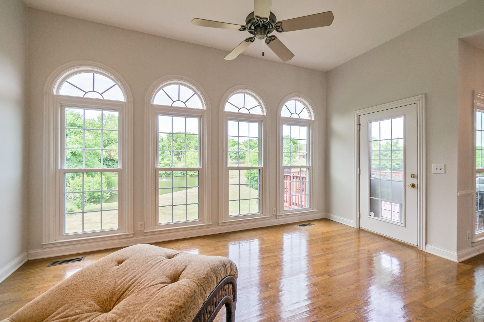 413 Doe Ridge Franklin, TN 37067 - Photo 9 of 42 a view of a livingroom with furniture window wooden floor and windows