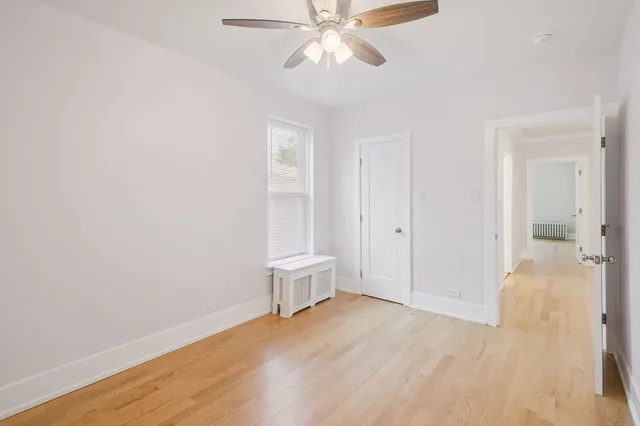 a view of an empty room and window