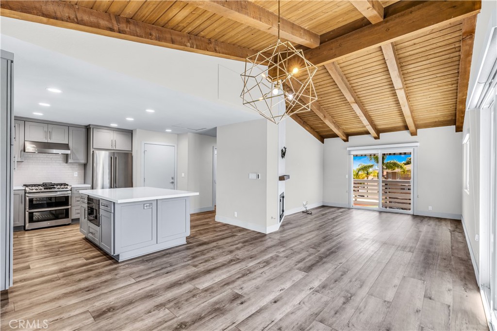 24502 Selva Road, Unit A2 Dana Point, CA 92629 - Photo 11 of 23 a view of a kitchen with a sink and a refrigerator