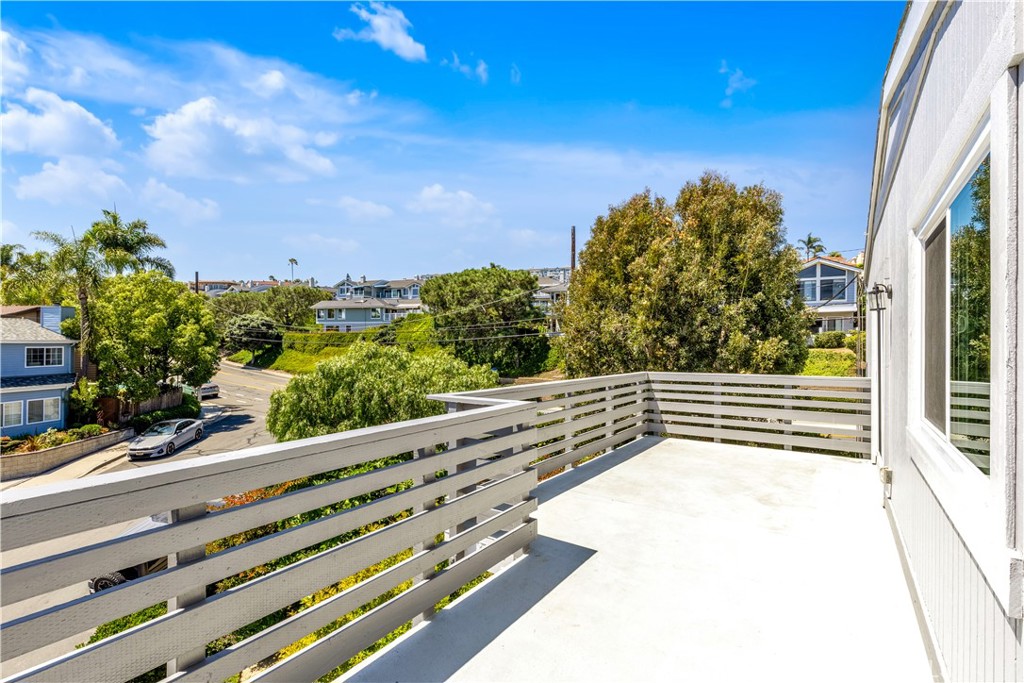 24502 Selva Road, Unit A2 Dana Point, CA 92629 - Photo 21 of 23 a view of a balcony with an outdoor space