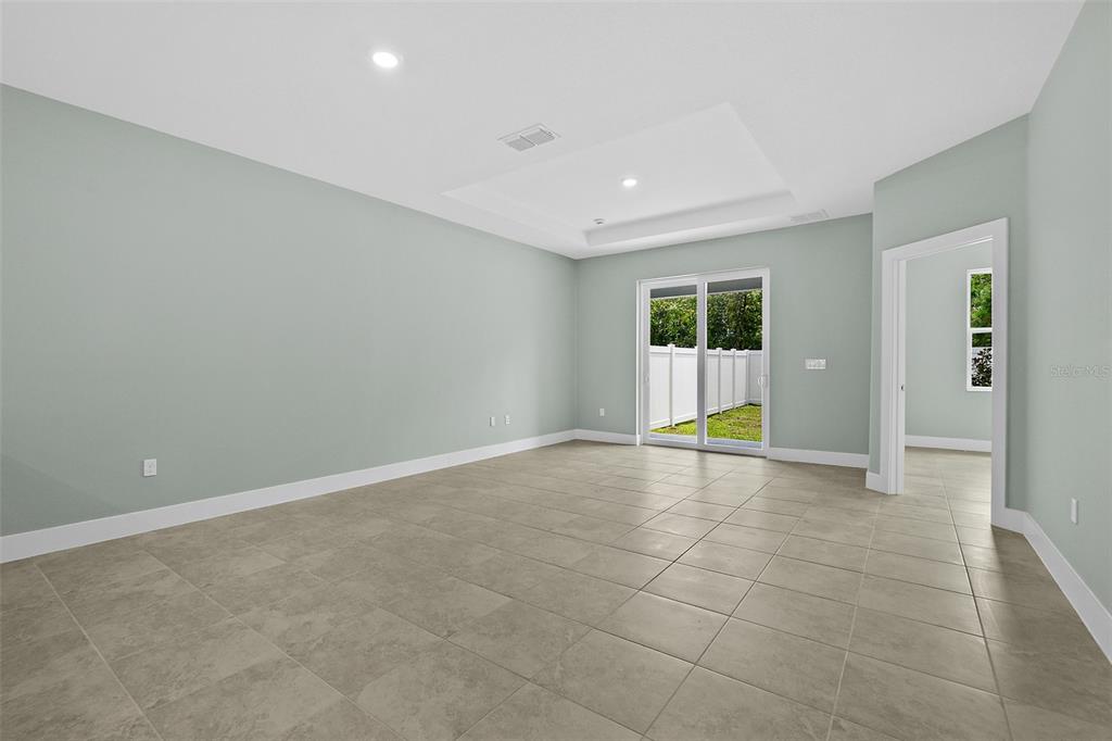 13 Karas Trail Palm Coast, FL 32164 - Photo 15 of 37 an empty room with entrance and door
