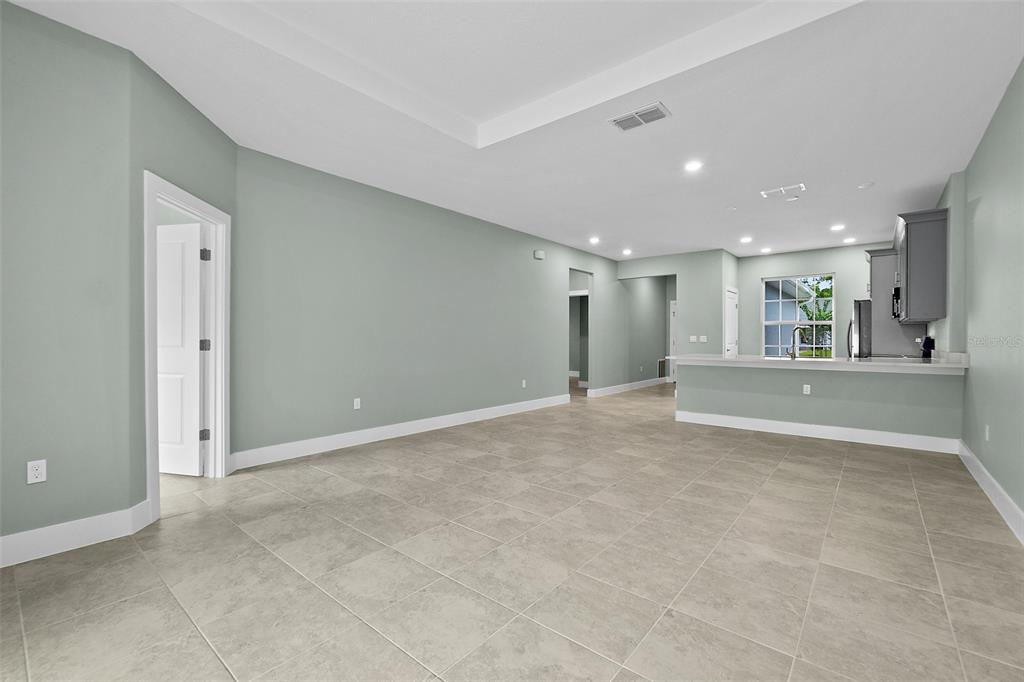 13 Karas Trail Palm Coast, FL 32164 - Photo 17 of 37 a view of an empty room and a cabinet