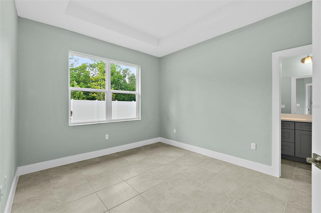 13 Karas Trail Palm Coast, FL 32164 - Photo 19 of 37 an empty room with windows