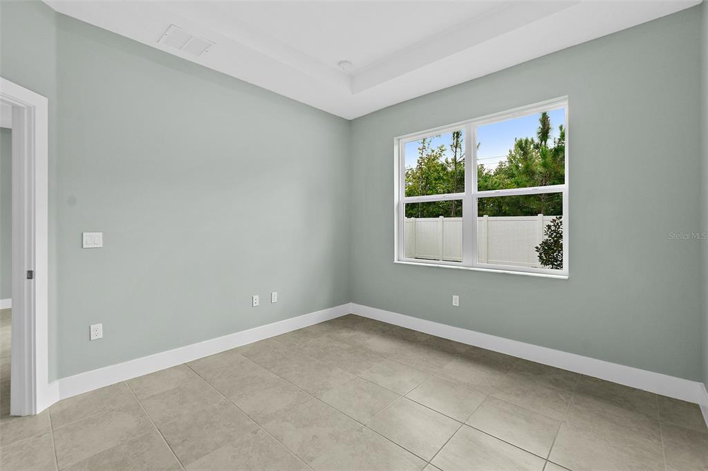 13 Karas Trail Palm Coast, FL 32164 - Photo 20 of 37 an empty room with a window