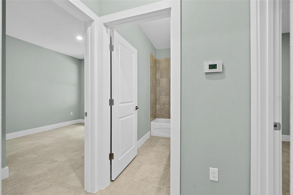 13 Karas Trail Palm Coast, FL 32164 - Photo 27 of 37 a view of a bathroom with a shower