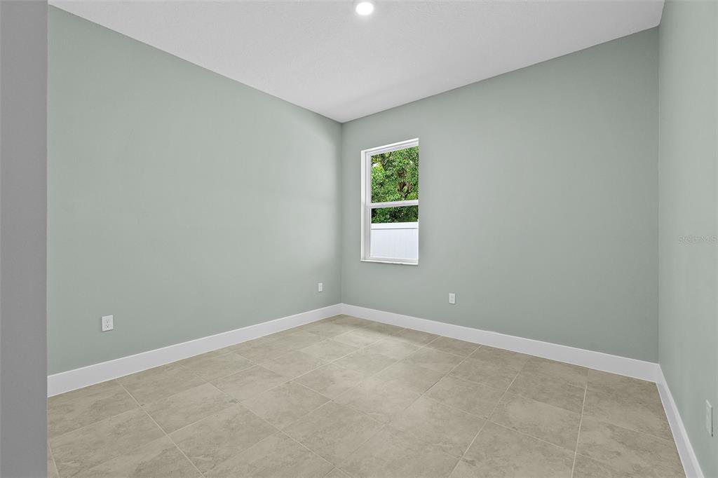 13 Karas Trail Palm Coast, FL 32164 - Photo 28 of 37 an empty room with windows