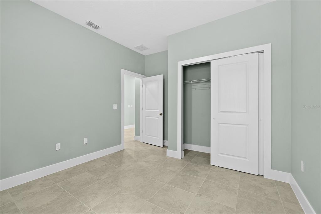 13 Karas Trail Palm Coast, FL 32164 - Photo 29 of 37 an empty room with closet area