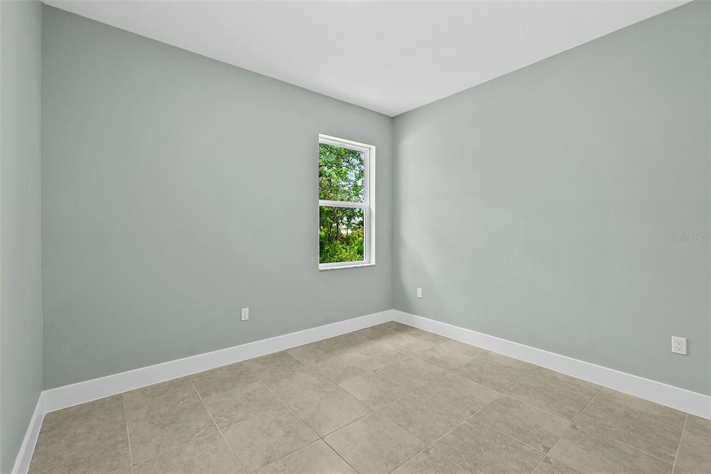 13 Karas Trail Palm Coast, FL 32164 - Photo 30 of 37 an empty room with a window