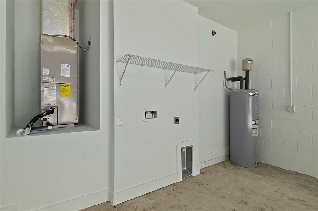 13 Karas Trail Palm Coast, FL 32164 - Photo 31 of 37 a view of a storage & utility room with closet