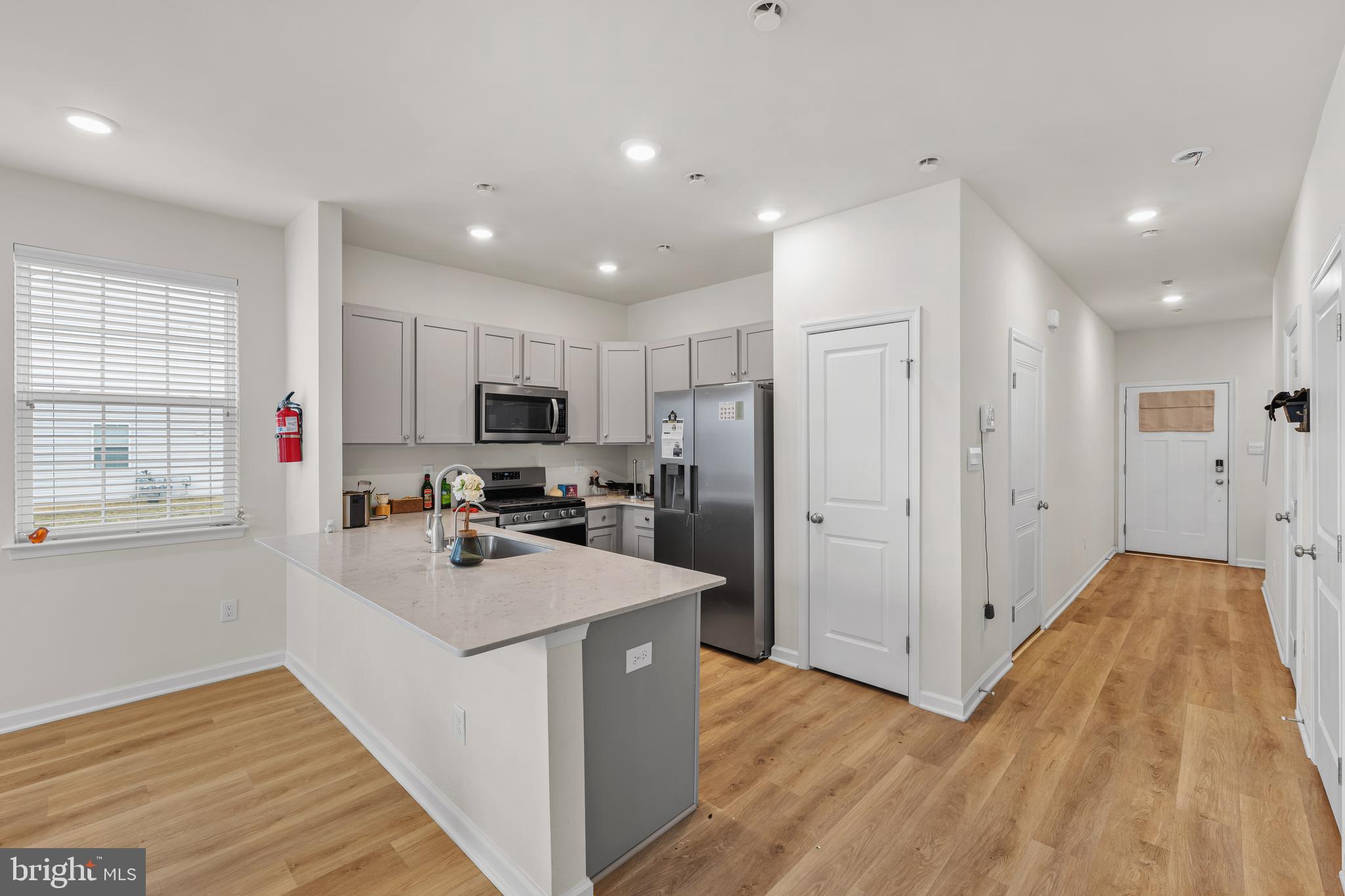 39 Nelsons Way Westampton, NJ 08060 - Photo 14 of 23 a kitchen with refrigerator cabinets and wooden floor