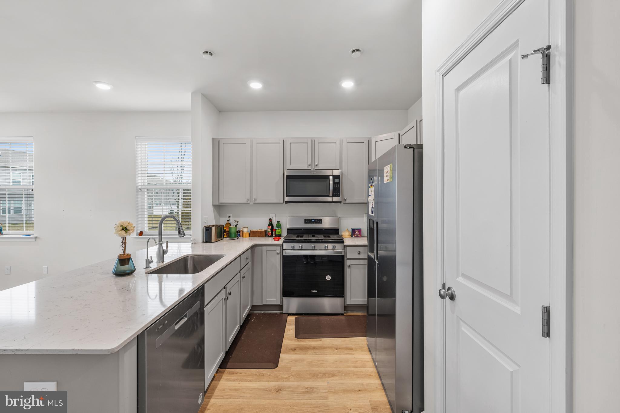 39 Nelsons Way Westampton, NJ 08060 - Photo 15 of 23 a kitchen with granite countertop a refrigerator and a sink