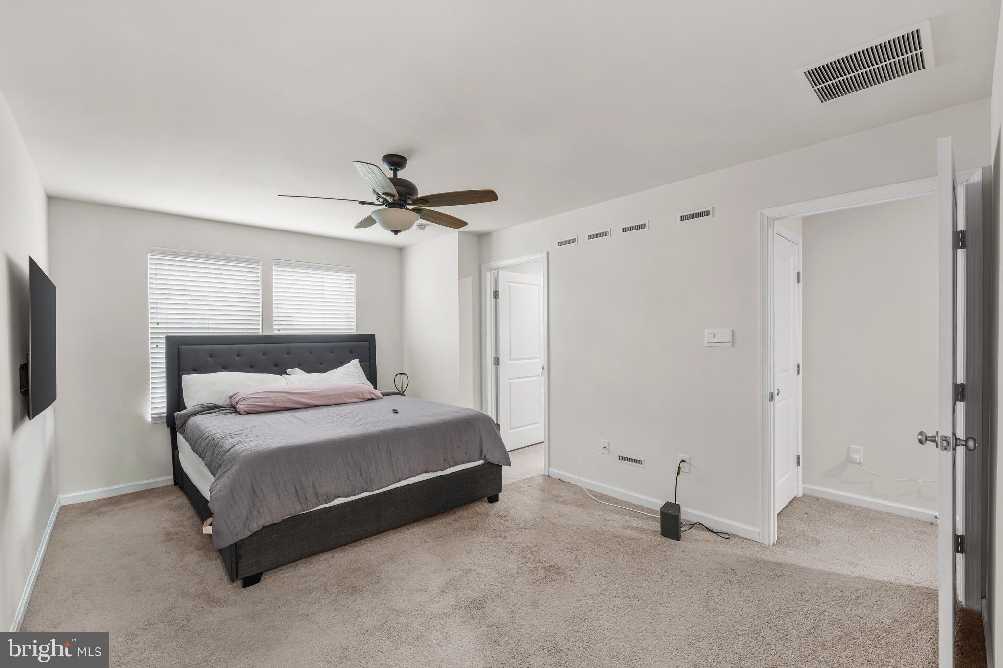 39 Nelsons Way Westampton, NJ 08060 - Photo 17 of 23 a bedroom with a bed and a ceiling fan