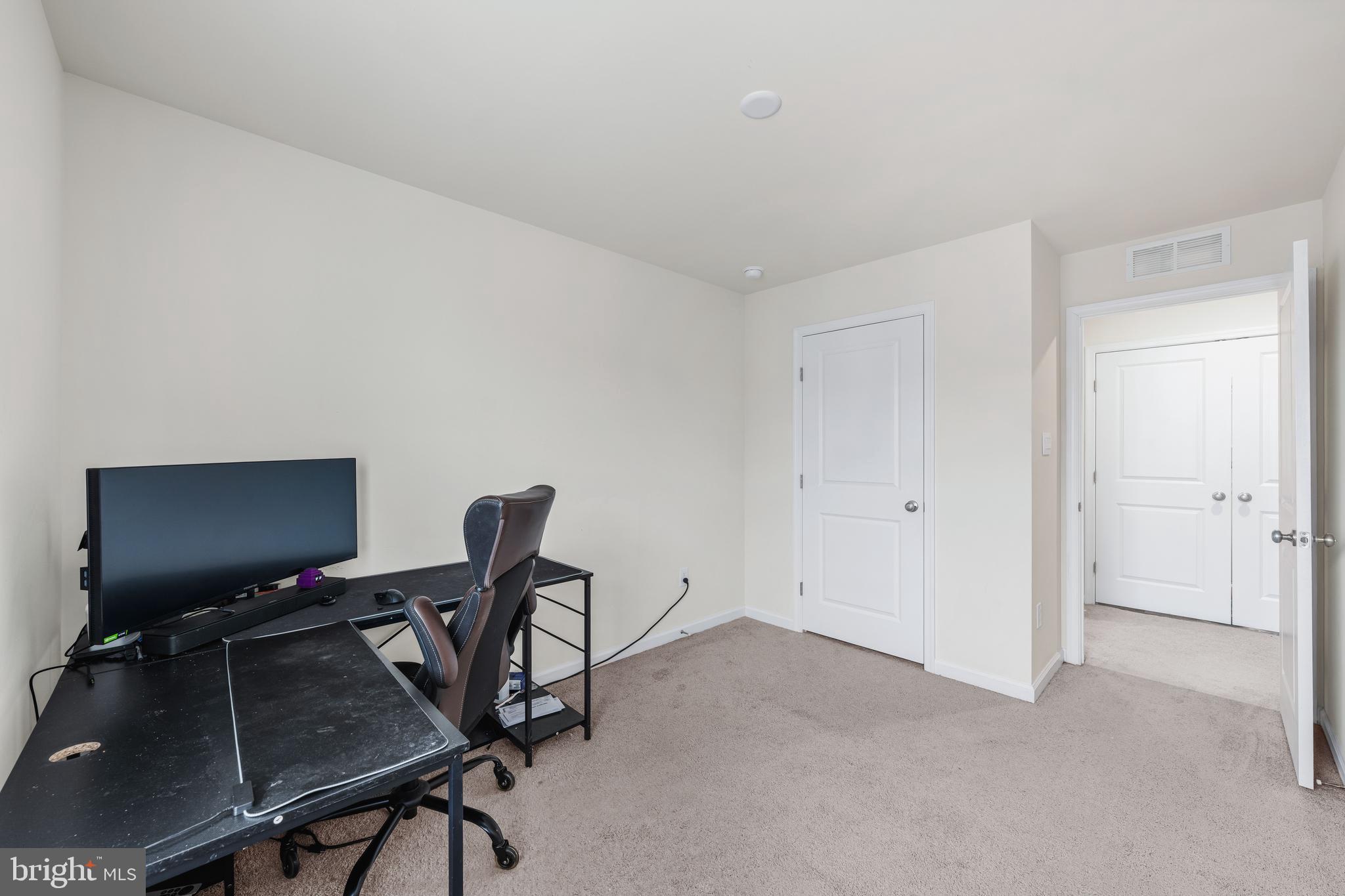 39 Nelsons Way Westampton, NJ 08060 - Photo 19 of 23 a view of a workspace with furniture and a window