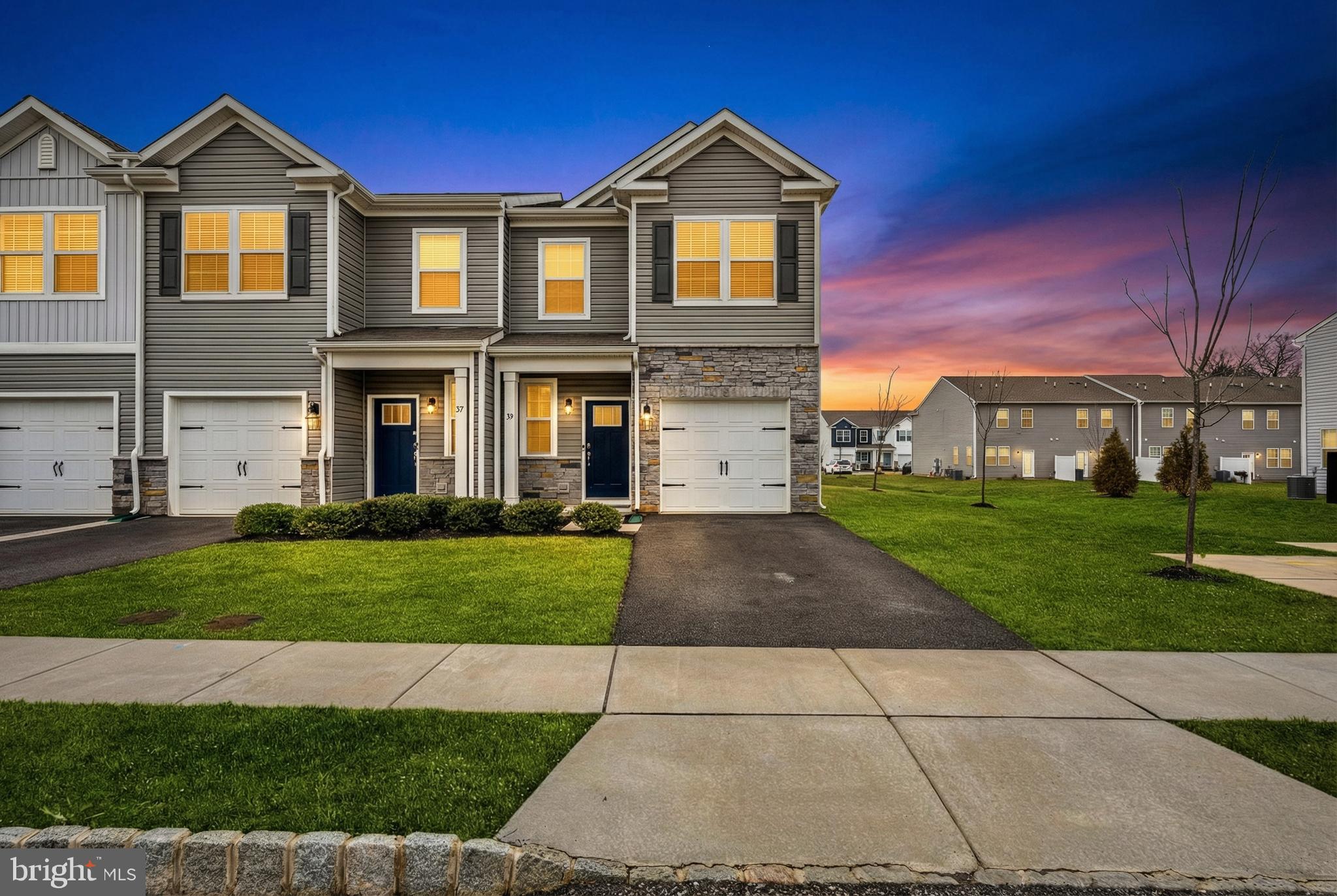 39 Nelsons Way Westampton, NJ 08060 - Photo 2 of 23 a front view of a house with a yard