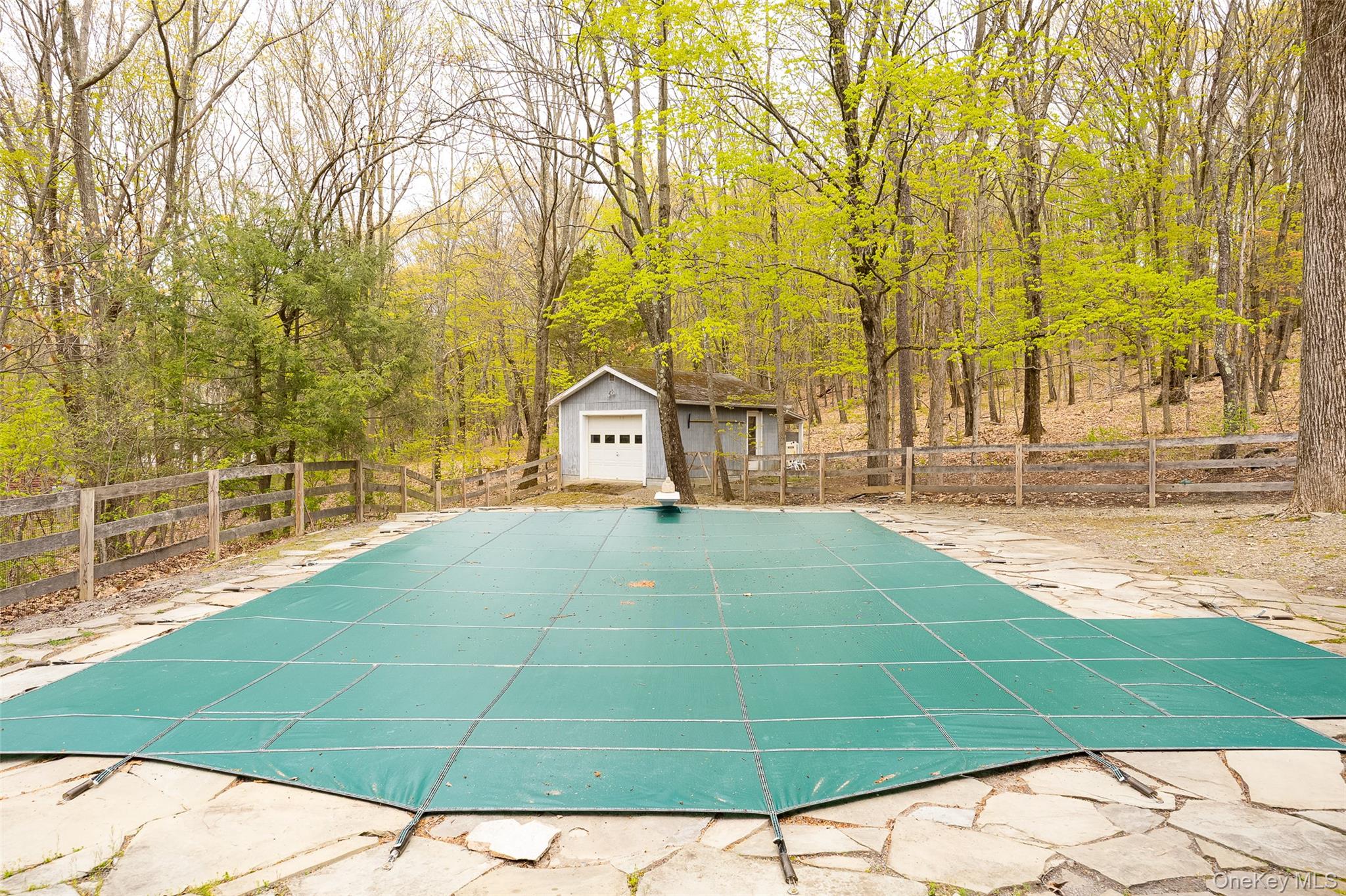 33 Willow Brook Ridge Clinton Corners, NY 12514 - Photo 43 of 50 a view of a tennis ground with large trees