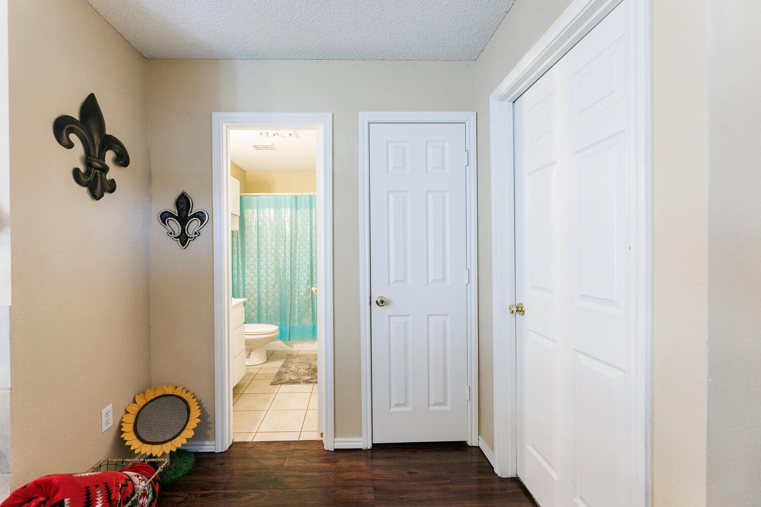 3416 97th Street Lubbock, TX 79423 - Photo 12 of 14 a view of entryway with wooden floor