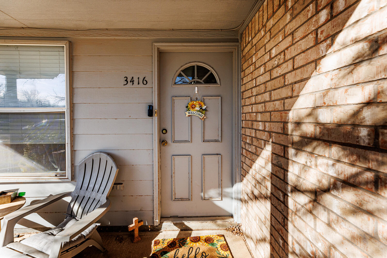 3416 97th Street Lubbock, TX 79423 - Photo 5 of 14 a front view of a house with outdoor seating
