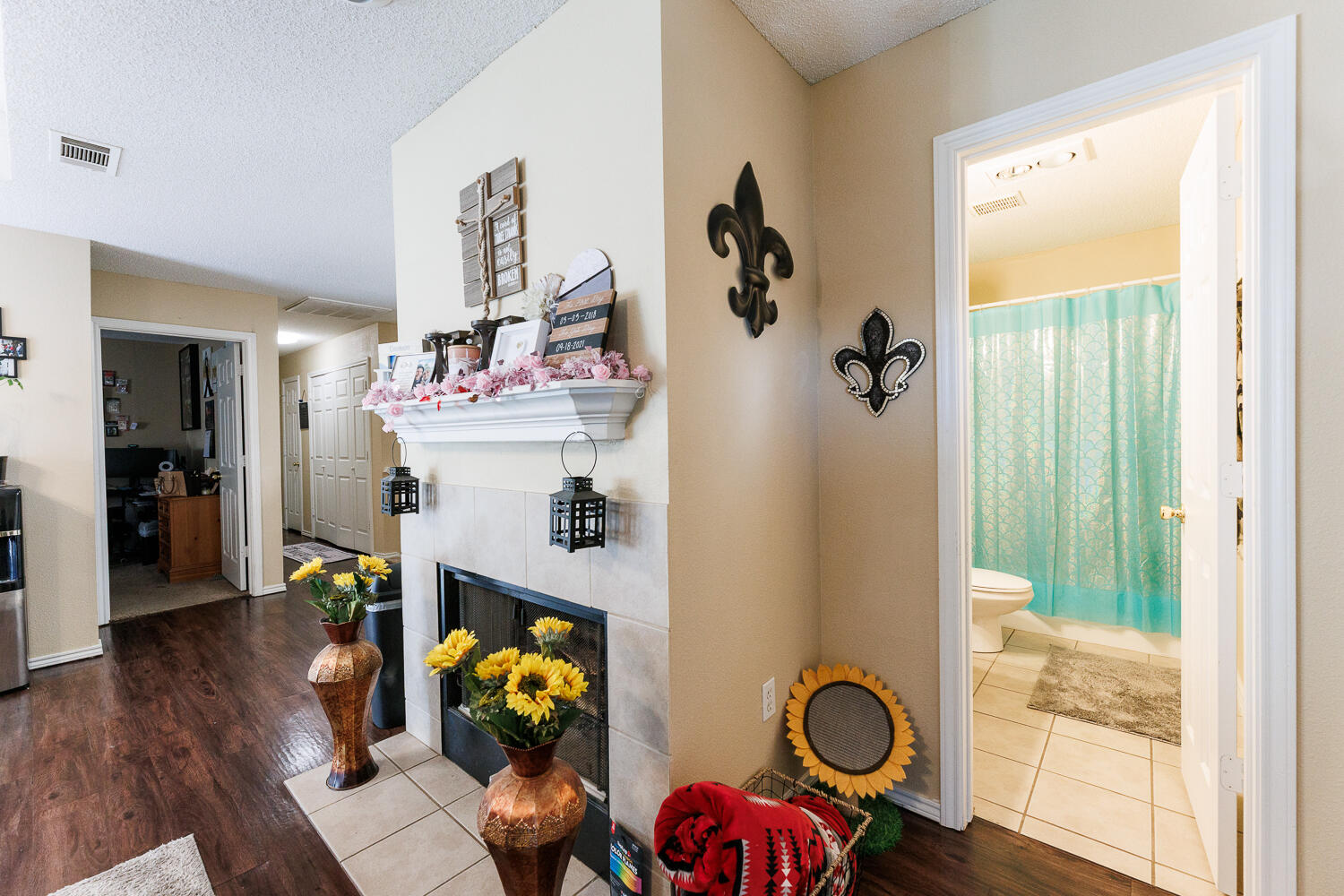 3416 97th Street Lubbock, TX 79423 - Photo 8 of 14 a view of living room with furniture and wooden floor