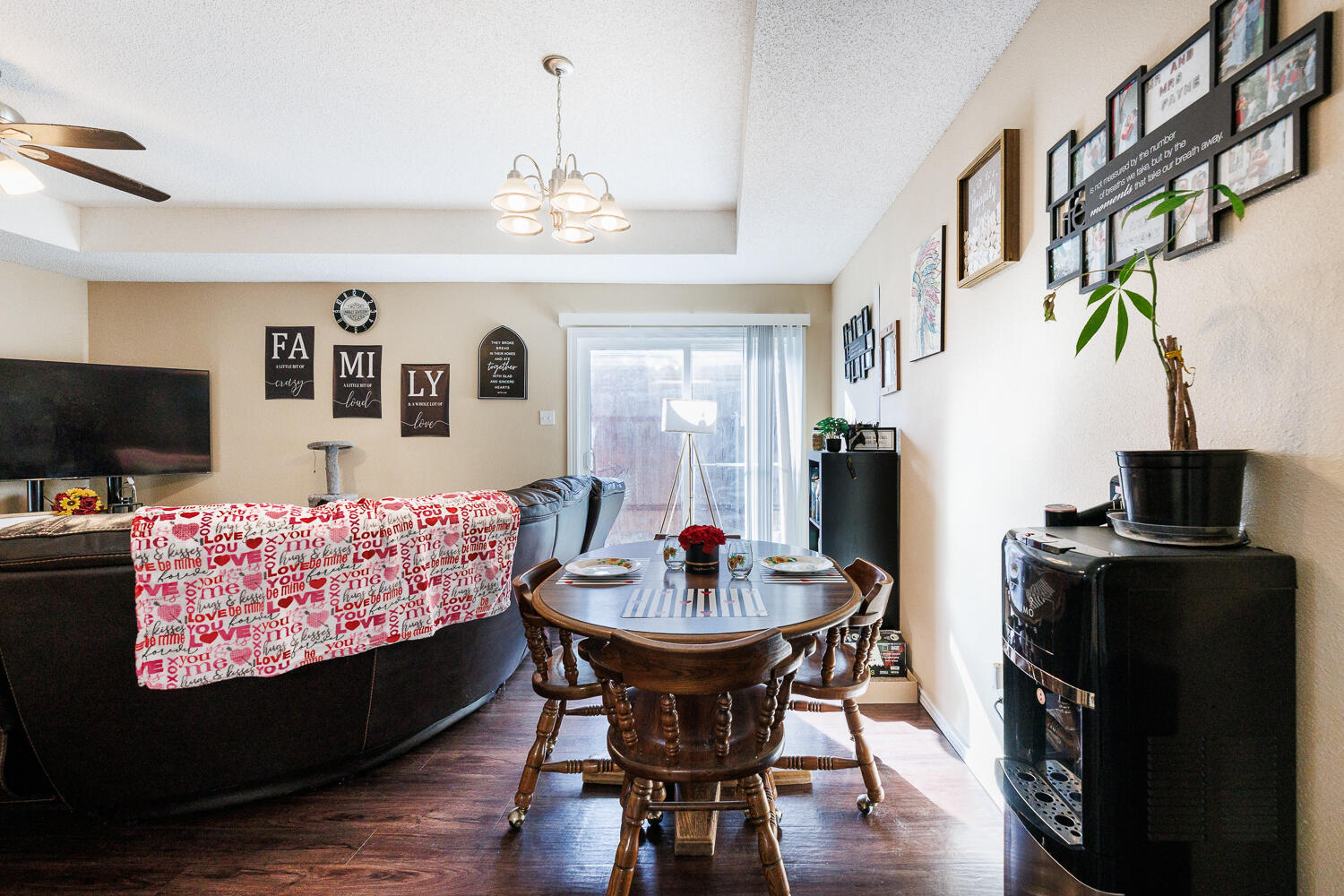 3416 97th Street Lubbock, TX 79423 - Photo 9 of 14 a view of a dining room with furniture and wooden floor