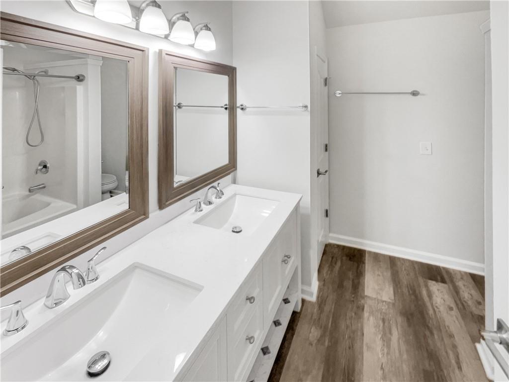 24 Chelsea Lane Grantville, GA 30220 - Photo 16 of 20 a bathroom with a sink and a mirror