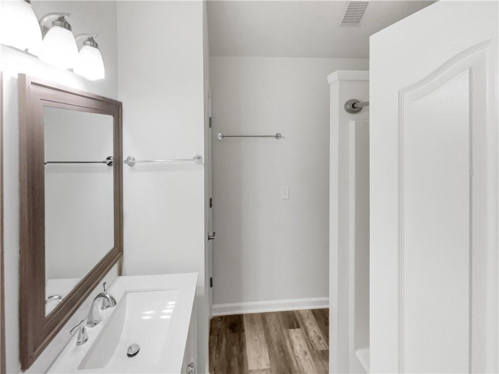 24 Chelsea Lane Grantville, GA 30220 - Photo 17 of 20 a bathroom with a tub and shower