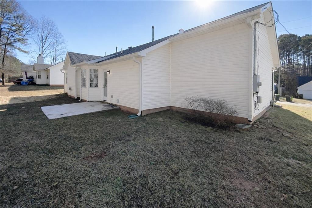 24 Chelsea Lane Grantville, GA 30220 - Photo 19 of 20 a view of a back yard of the house