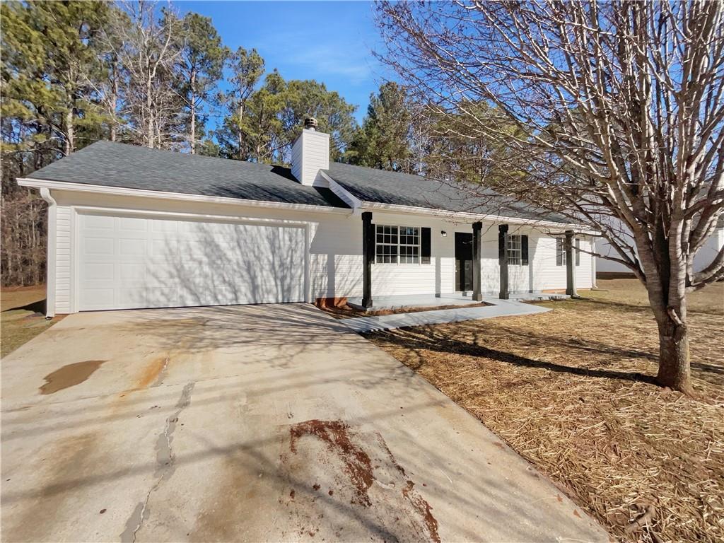 24 Chelsea Lane Grantville, GA 30220 - Photo 2 of 20 a view of a house with a snow on the road