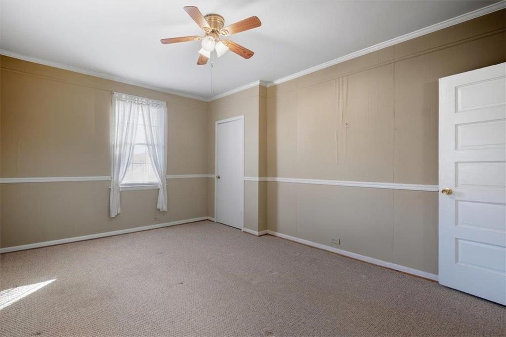 1 Poplar Street Northeast Rome, GA 30161 - Photo 22 of 28 an empty room with closet and windows