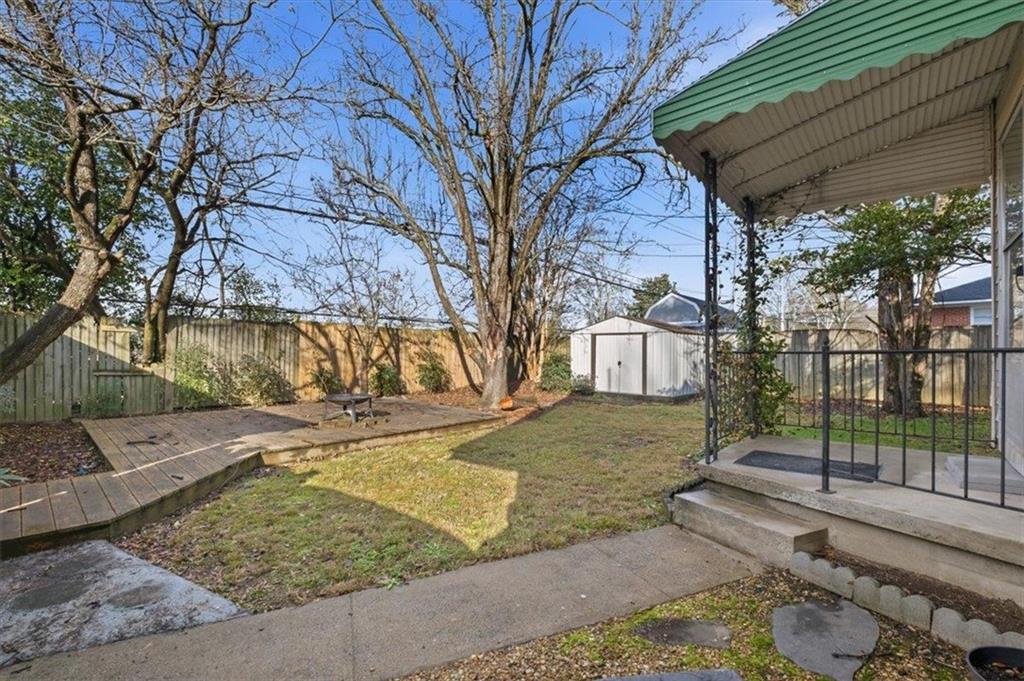 1 Poplar Street Northeast Rome, GA 30161 - Photo 26 of 28 a view of a yard with yellow house