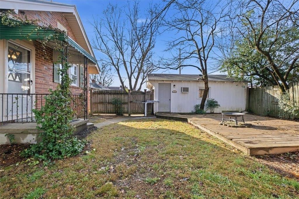 1 Poplar Street Northeast Rome, GA 30161 - Photo 28 of 28 a front view of a house with a yard and garage