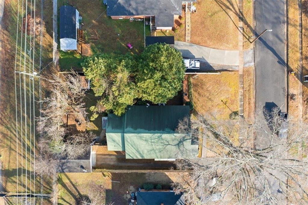 1 Poplar Street Northeast Rome, GA 30161 - Photo 4 of 28 a front view of a house with a yard