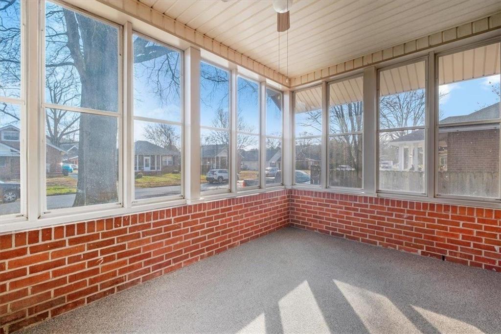 1 Poplar Street Northeast Rome, GA 30161 - Photo 7 of 28 a view of an empty room with a large window