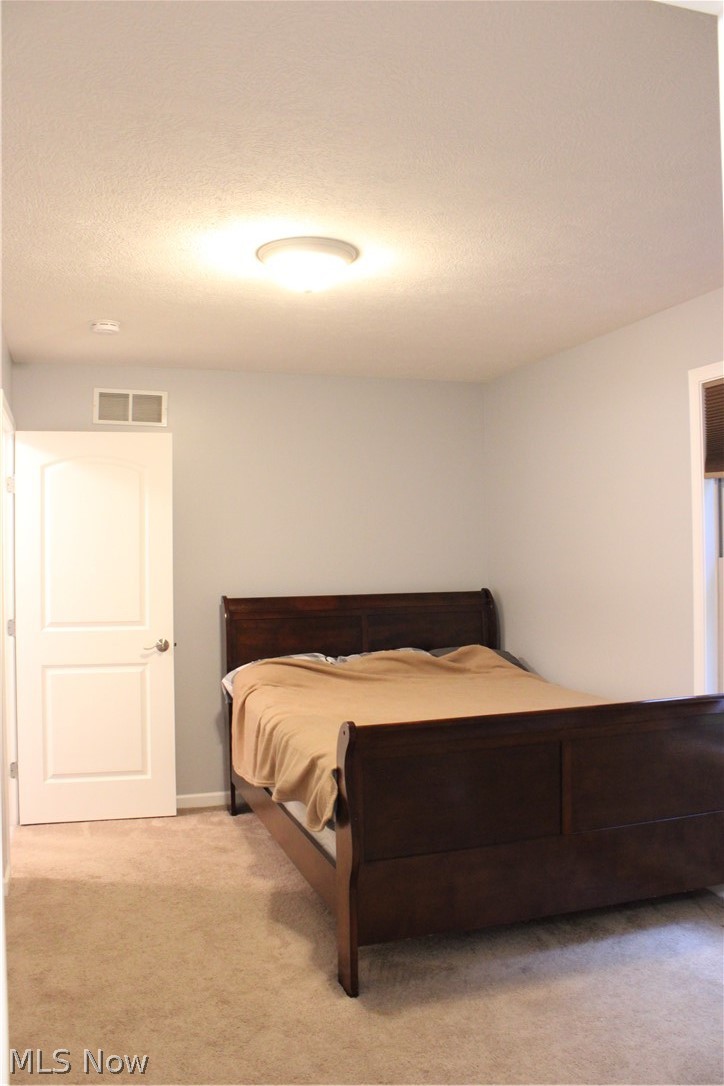 202 Home Street Rittman, OH 44270 - Photo 39 of 47 Light-colored wall paint, white trim, and a flush mount ceiling light