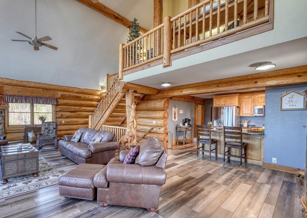 103 Wisteria Drive Murphy, NC 28906 - Photo 11 of 62 a living room with furniture and wooden floor