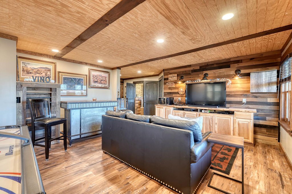 103 Wisteria Drive Murphy, NC 28906 - Photo 32 of 62 a living room with furniture and a flat screen tv