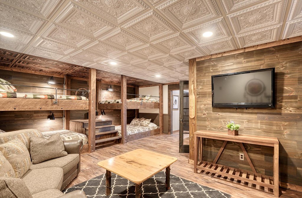103 Wisteria Drive Murphy, NC 28906 - Photo 39 of 62 a living room with furniture and a flat screen tv