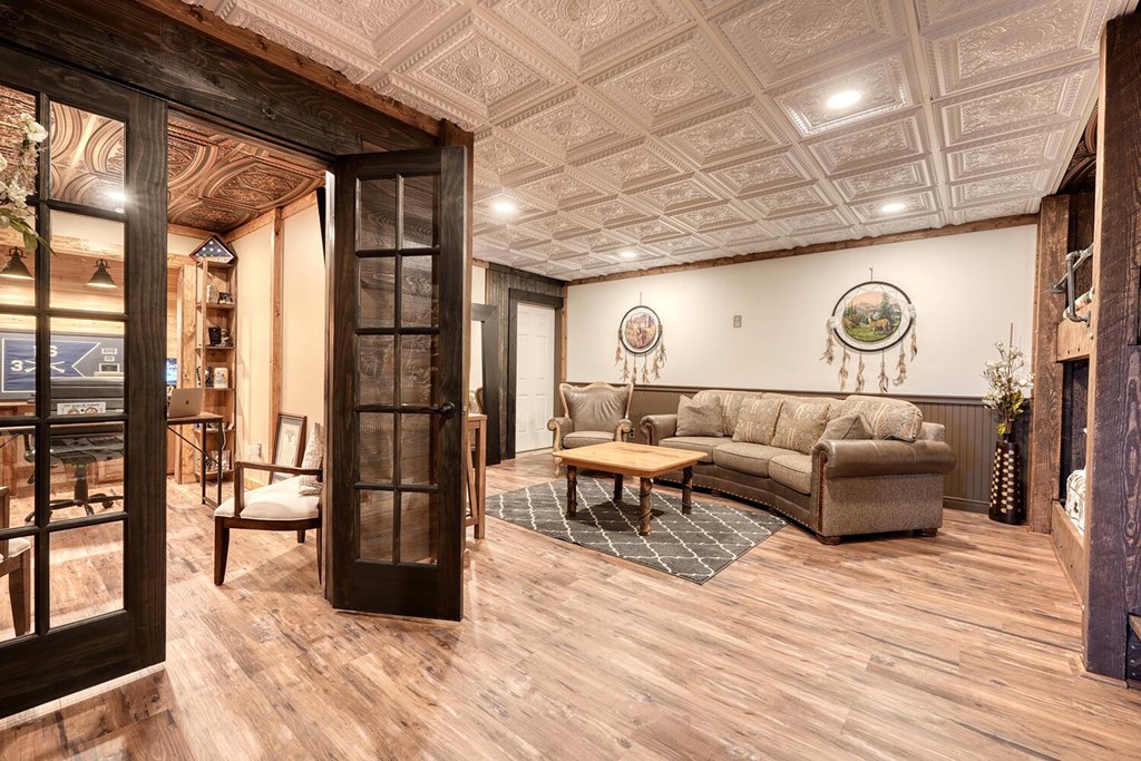 103 Wisteria Drive Murphy, NC 28906 - Photo 42 of 62 a living room with furniture and a wooden floor