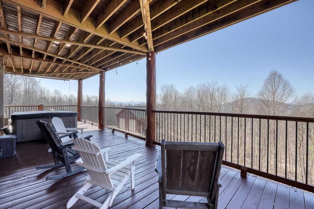 103 Wisteria Drive Murphy, NC 28906 - Photo 44 of 62 a view of chairs in wooden deck