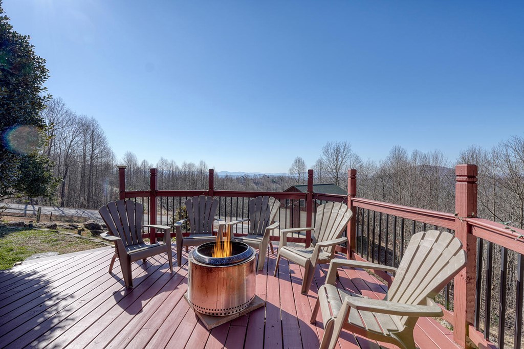 103 Wisteria Drive Murphy, NC 28906 - Photo 45 of 62 a view of a chairs and table on the wooden floor