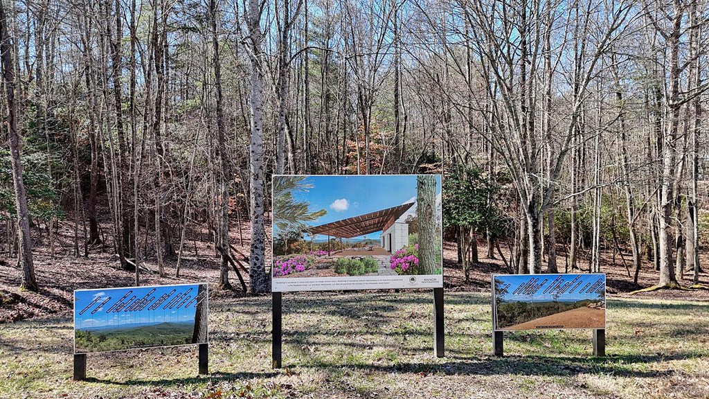 103 Wisteria Drive Murphy, NC 28906 - Photo 62 of 62 a view of bench sitting next to a road