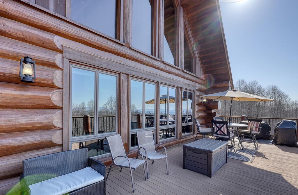 103 Wisteria Drive Murphy, NC 28906 - Photo 10 of 62 a outdoor living space with patio furniture and wooden floor