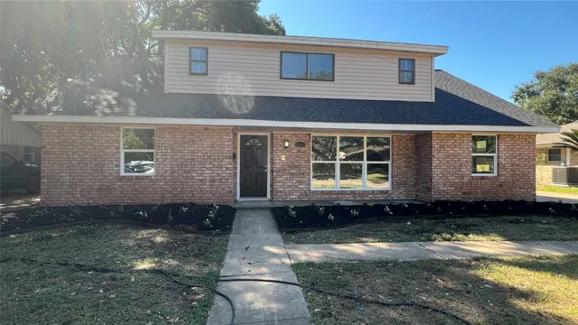 a house view with a garden space